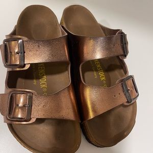 Bronze colored slip ons